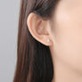 Pendientes triángulos con circonitas 'Tiny'. Plata de ley 925 - Sophie & Loheme