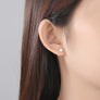 Pendientes triángulos con circonitas 'Tiny'. Plata de ley 925 - Sophie & Loheme