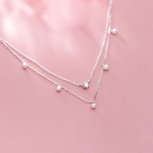 Doble cadena con circonita central y perlas 'Now'. Plata de ley 925 - Sophie & Loheme